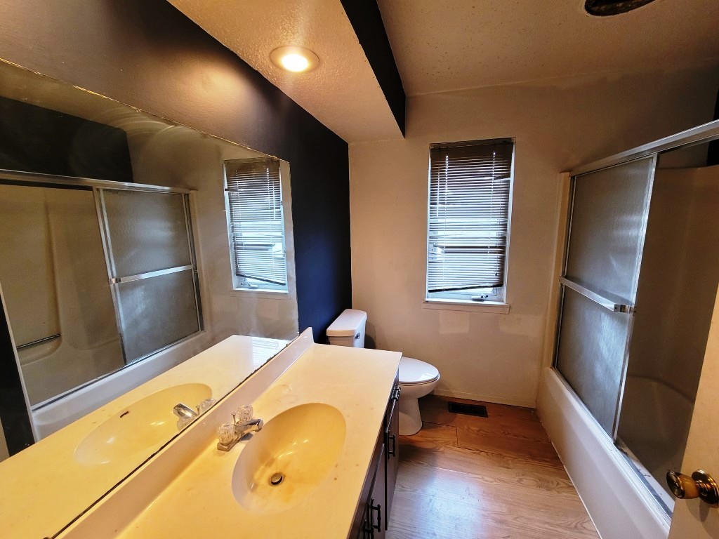 2601 Rachel Road Champaign, IL 61822 - Photo 12 of 22 a bedroom with a bed and wooden floor