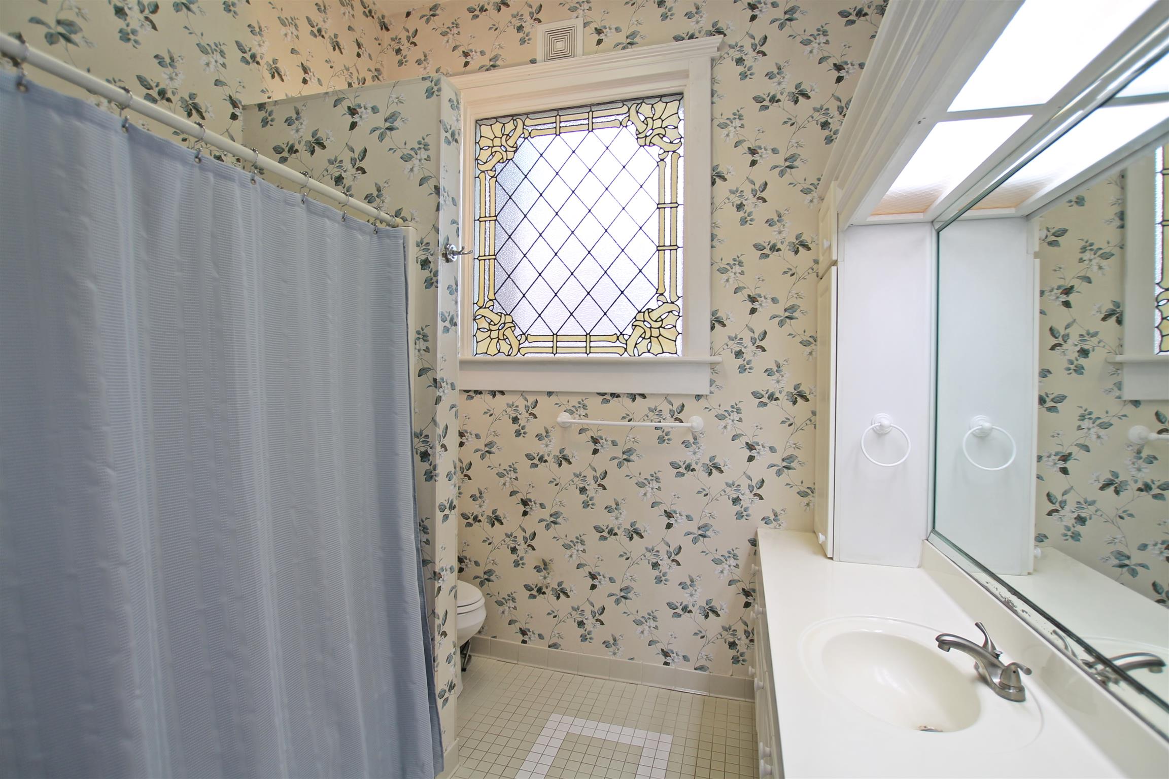 307 North Main Street Springfield, TN 37172 - Photo 14 of 30 a bathroom with a sink toilet and shower