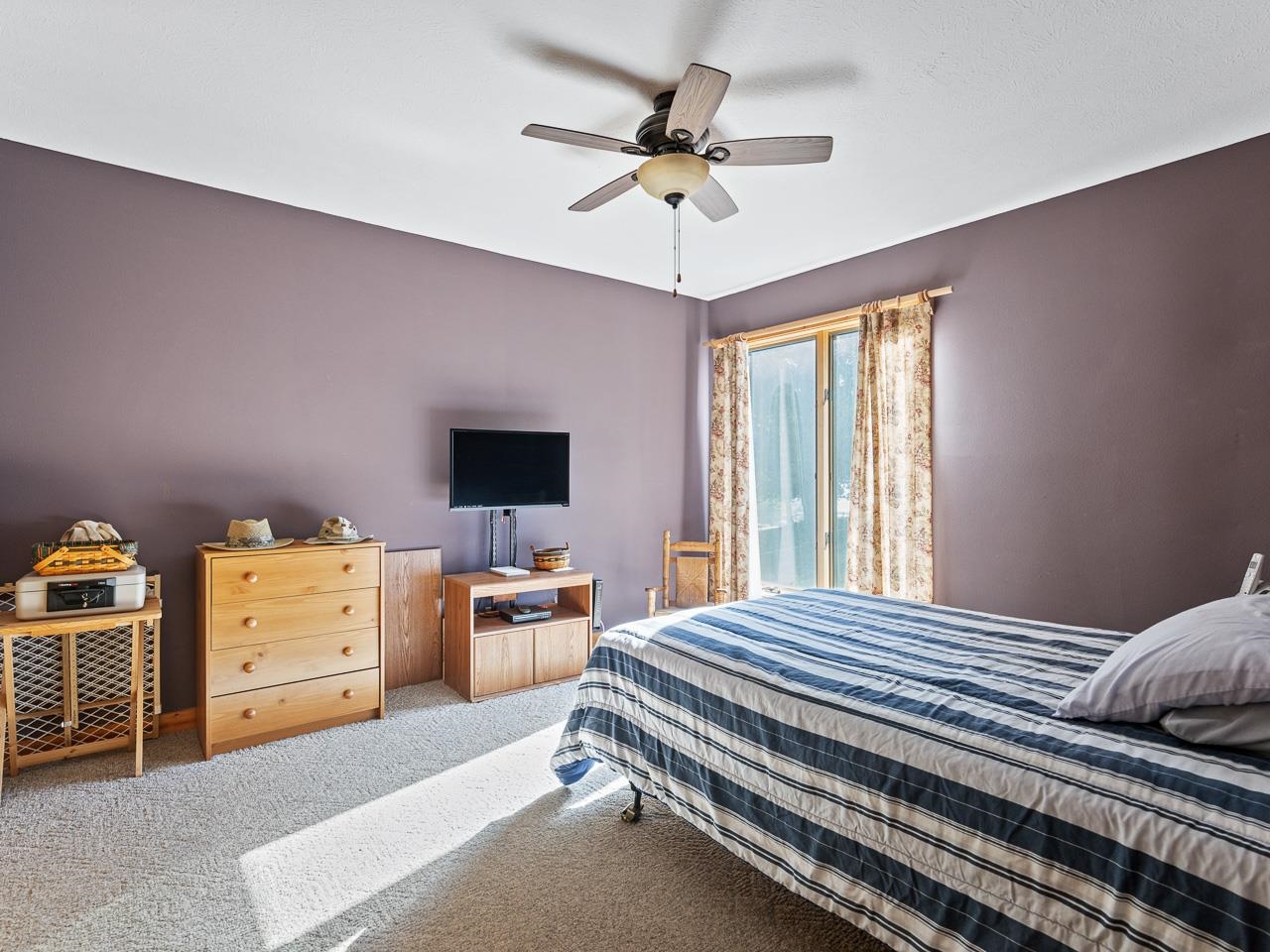 1 Lake Summerset Road Lake Summerset, IL 61019 - Photo 11 of 41 a bedroom with a bed and a television