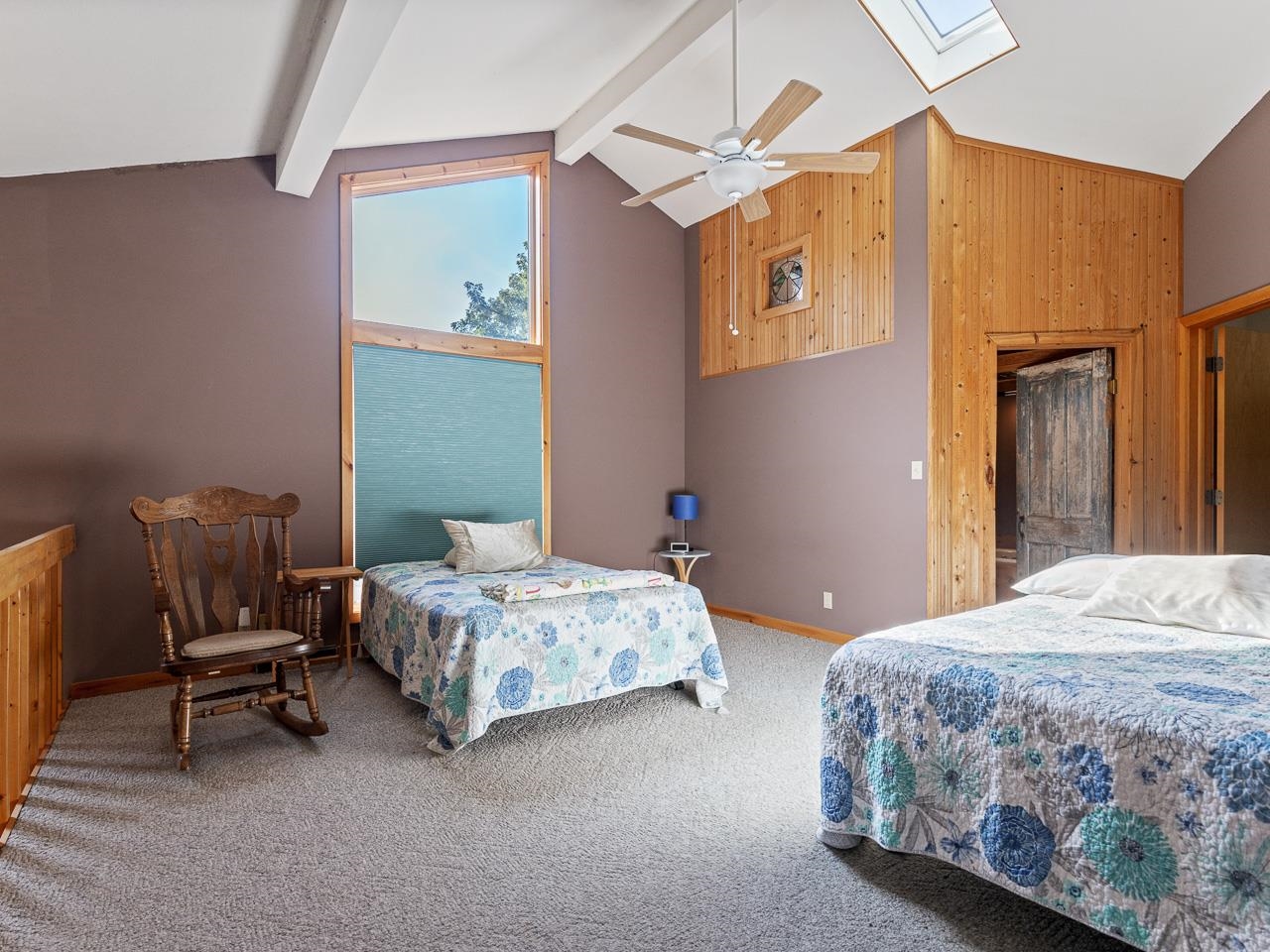 1 Lake Summerset Road Lake Summerset, IL 61019 - Photo 22 of 41 a bedroom with a bed a chair and painting on the wall