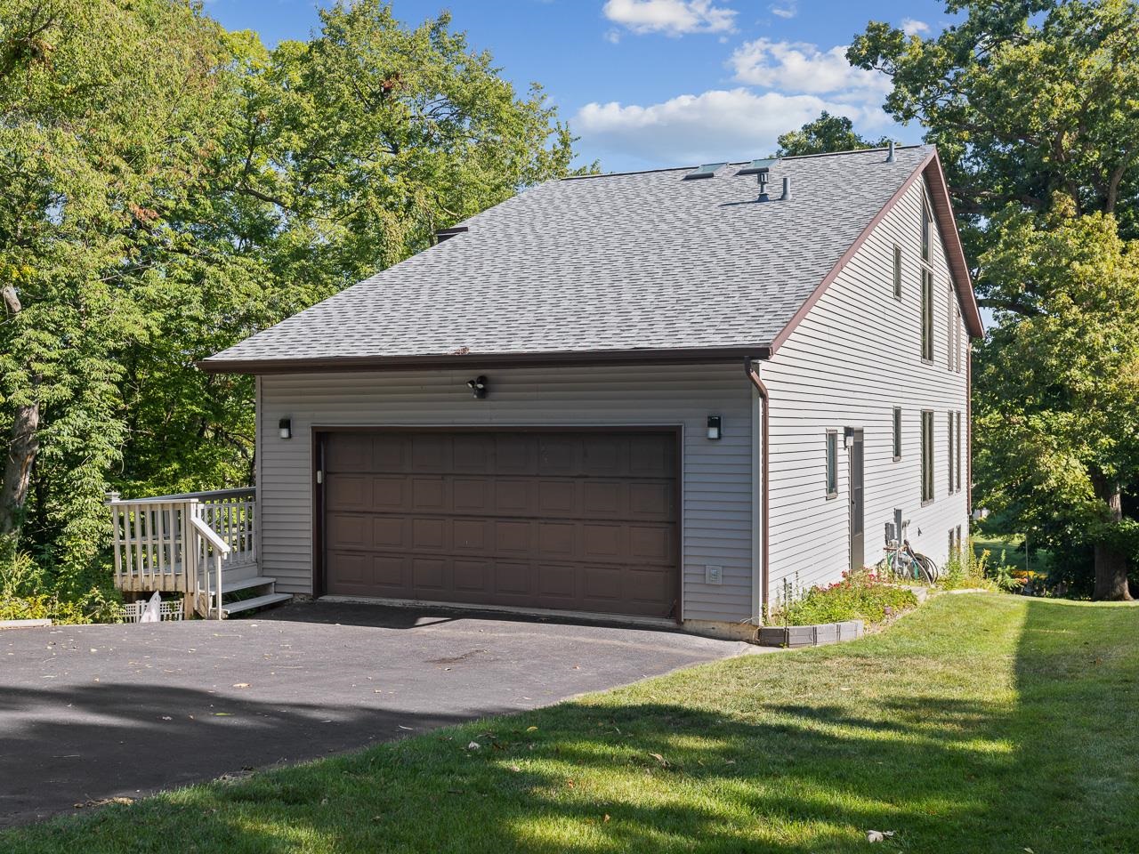 1 Lake Summerset Road Lake Summerset, IL 61019 - Photo 36 of 41 a house with a yard plants and large tree