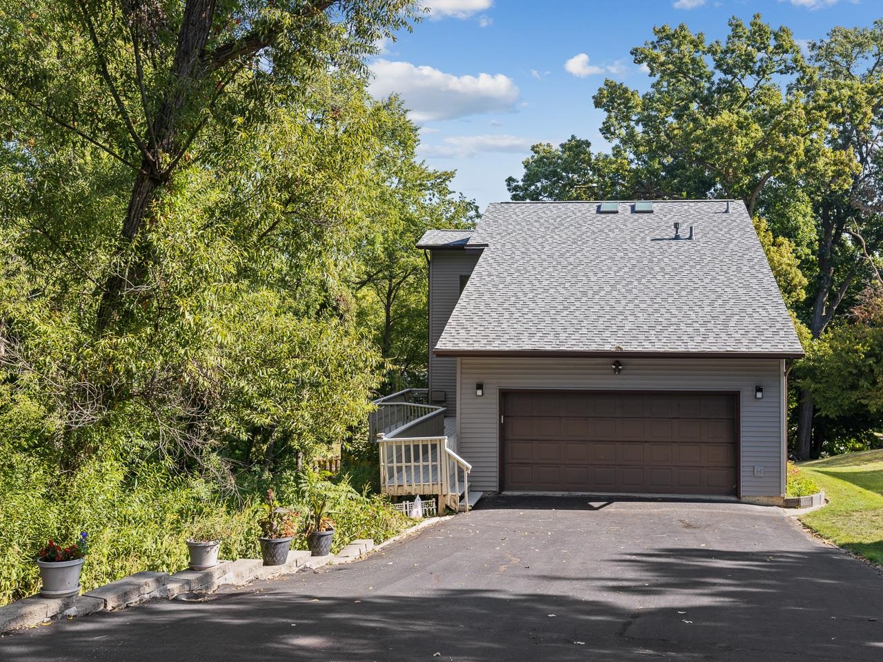 1 Lake Summerset Road Lake Summerset, IL 61019 - Photo 4 of 41 a front view of a house with a yard and garage