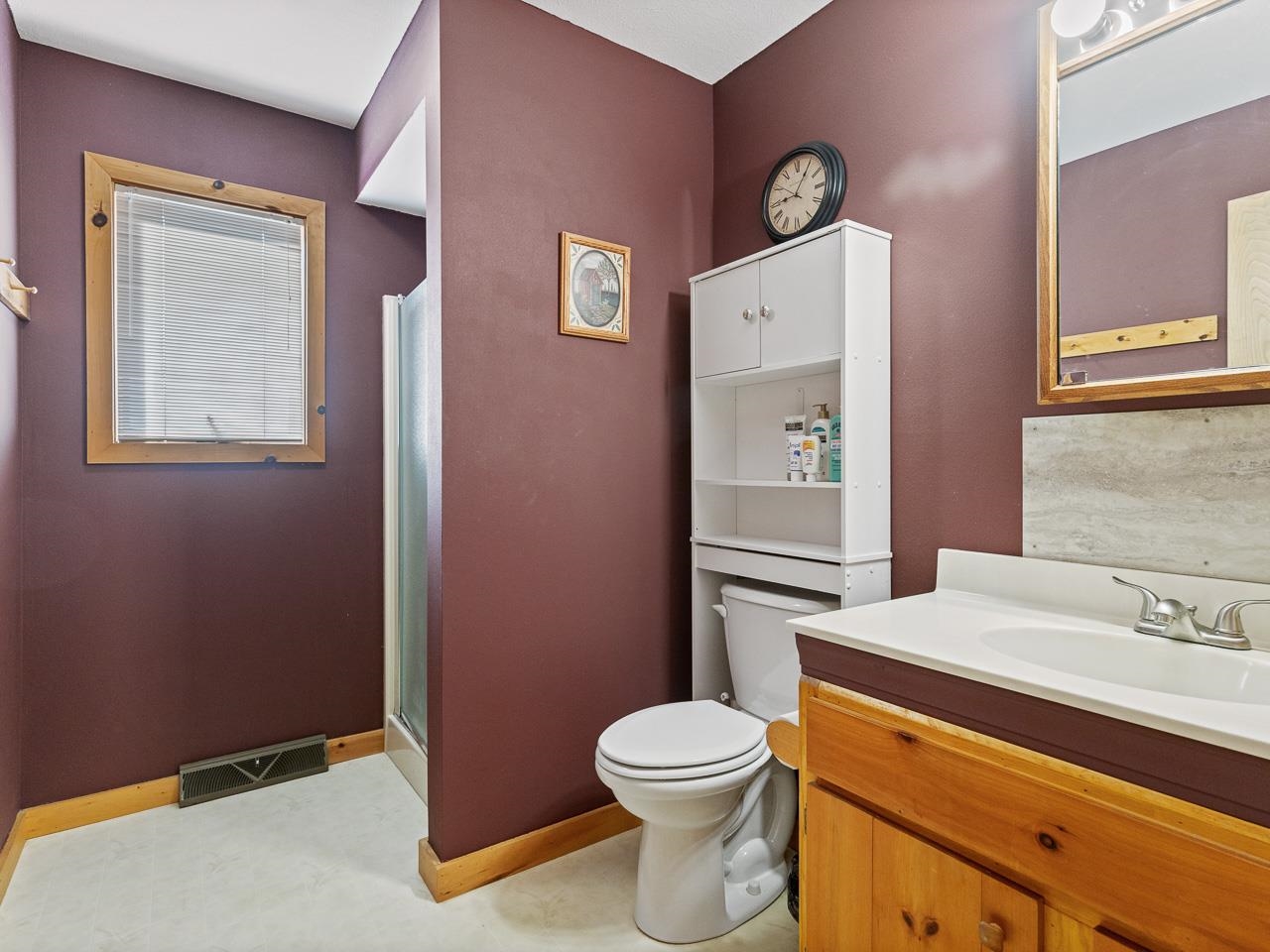 1 Lake Summerset Road Lake Summerset, IL 61019 - Photo 10 of 41 a bathroom with a toilet sink and mirror