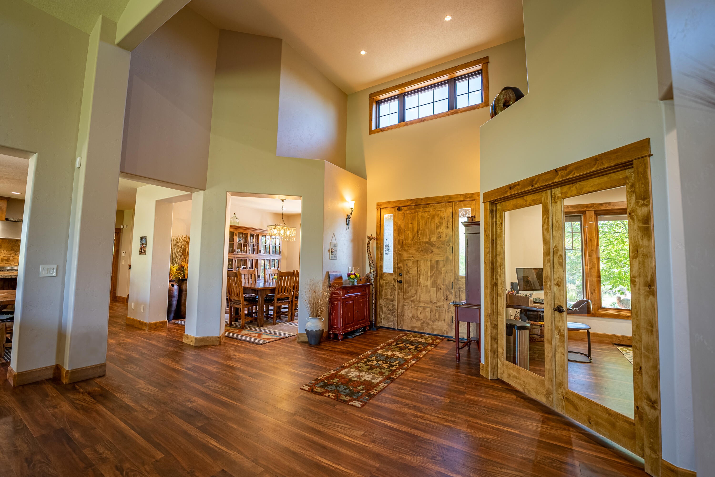 63545 Overtree Road Bend, OR 97701 - Photo 4 of 63 Enter to high ceilings, wood accents and lots of light!