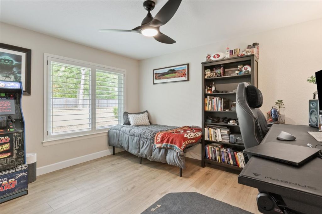 190 Young Ranch Road Georgetown, TX 78633 - Photo 34 of 40 Bedroom with light wood-type flooring, an office area, and ceiling fan