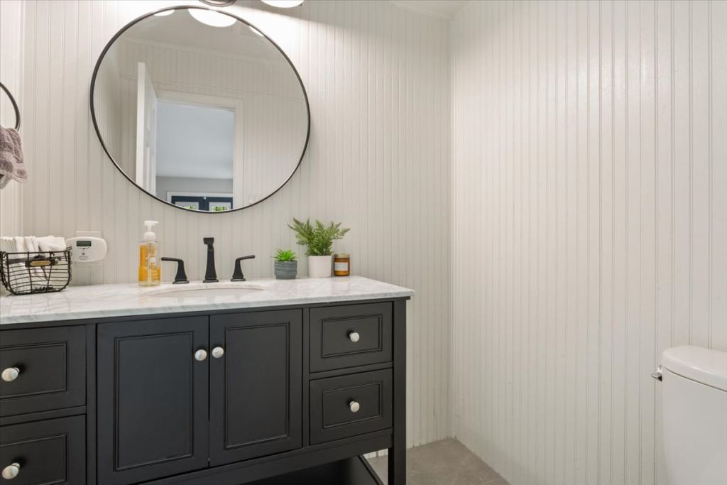 190 Young Ranch Road Georgetown, TX 78633 - Photo 35 of 40 Half bath featuring vanity and toilet