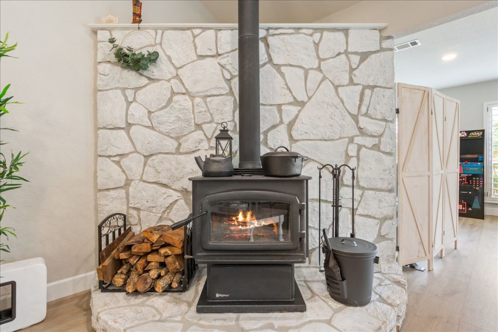 190 Young Ranch Road Georgetown, TX 78633 - Photo 9 of 40 Detailed view of wood finished floors and baseboards