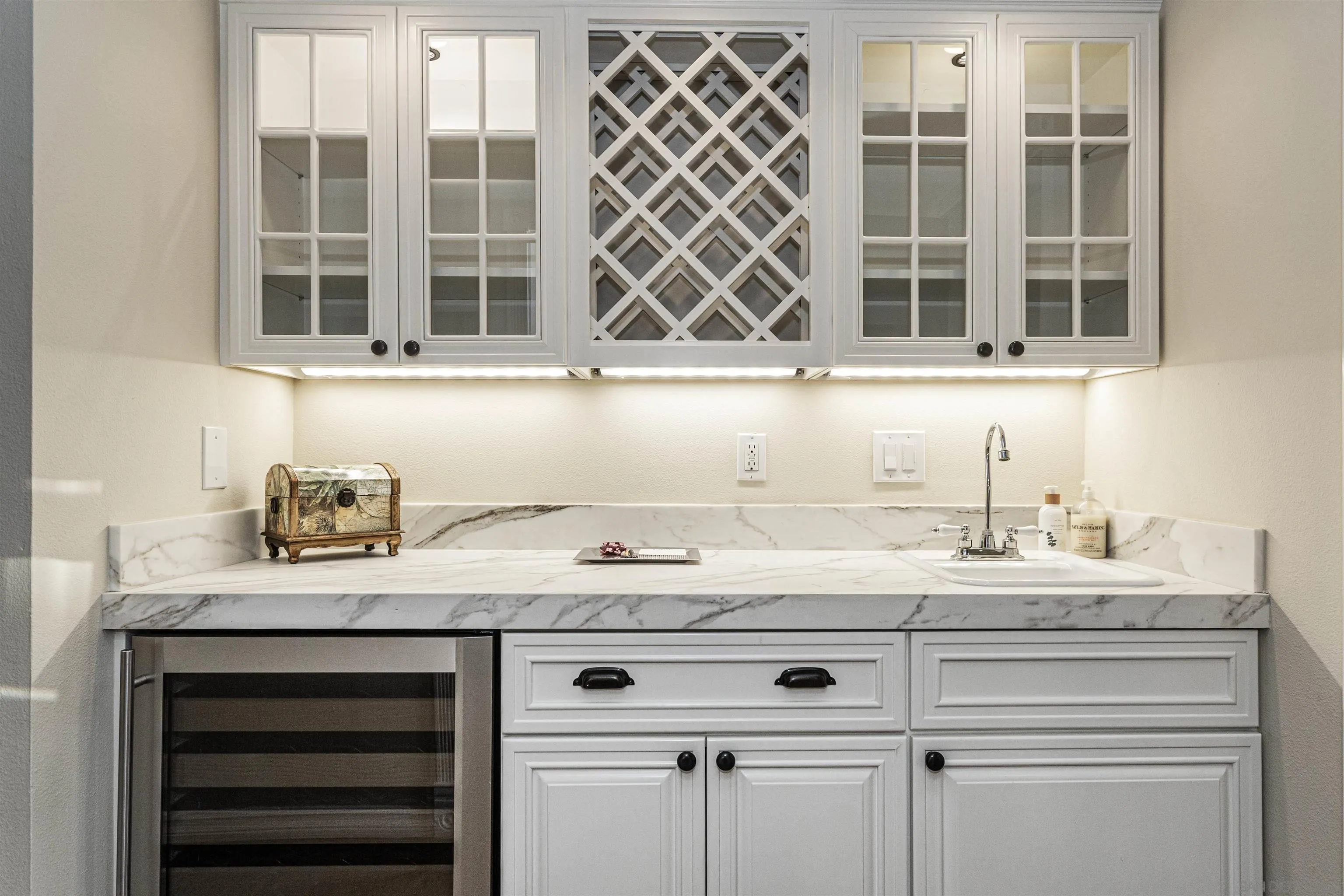 6571 Mimulus Rancho Santa Fe, CA 92067 - Photo 15 of 55 a bathroom with a sink and a mirror
