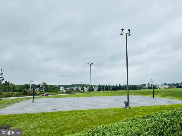 a view of a park with swings