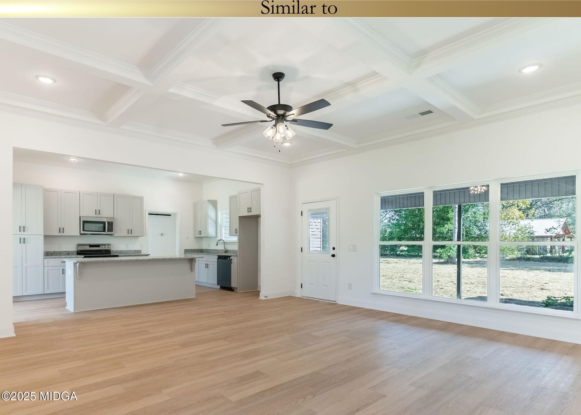 106 Maries Gdn Trail Macon, GA 31216 - Photo 9 of 19 a view of a kitchen with a sink and a stove