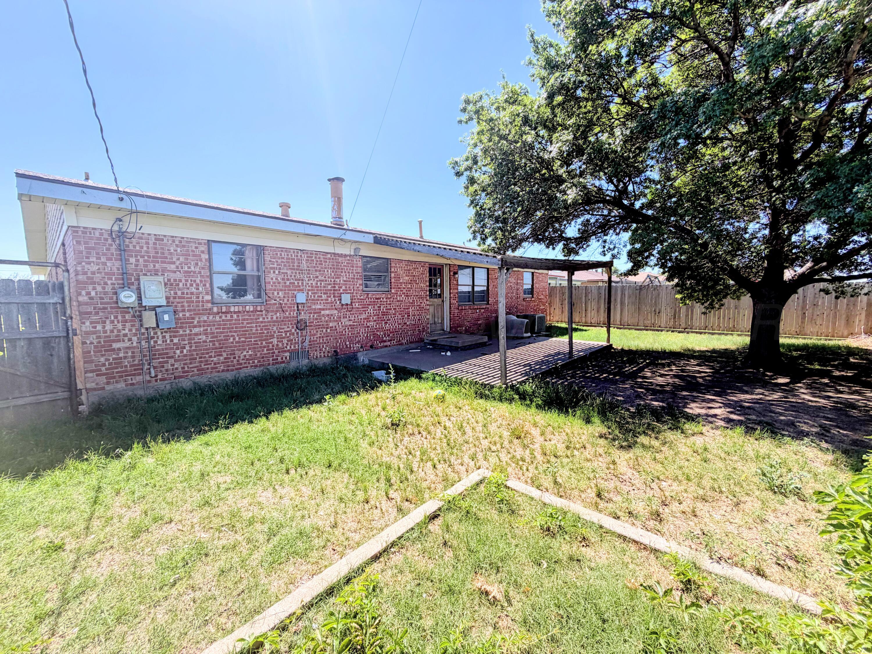 1010 Northwestern Street Perryton, TX 79070 - Photo 31 of 32 1010 NORTHWESTERN EXTERIOR REAR ANGLE