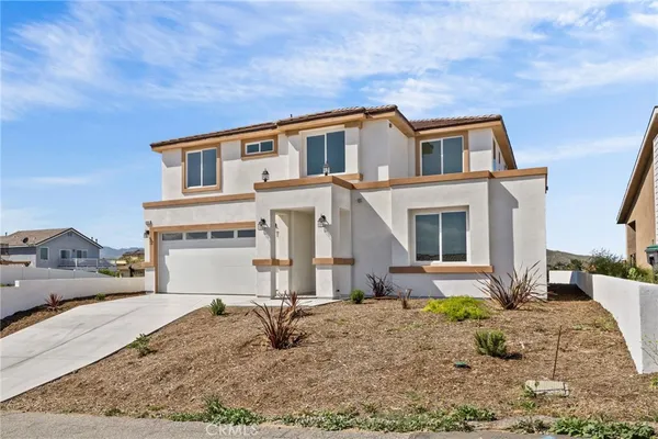 a house view with a outdoor space