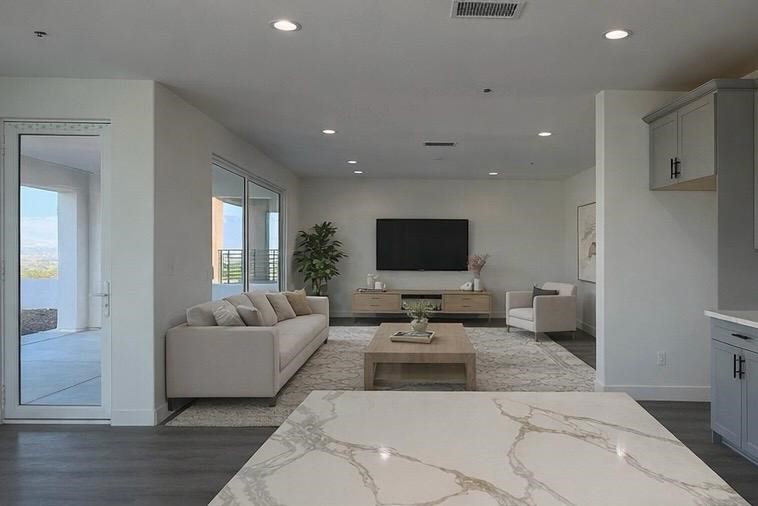 16765 La Bella Villa Riverside, CA 92503 - Photo 11 of 27 a living room with furniture and a flat screen tv