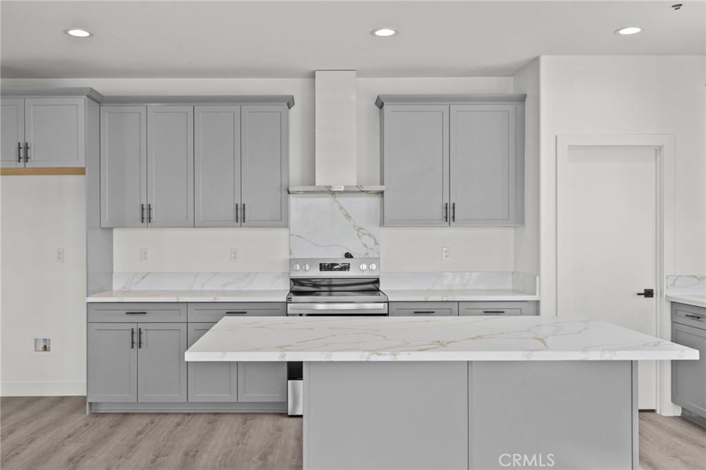 16765 La Bella Villa Riverside, CA 92503 - Photo 6 of 27 a view of cabinets a sink and dishwasher in a white kitchen