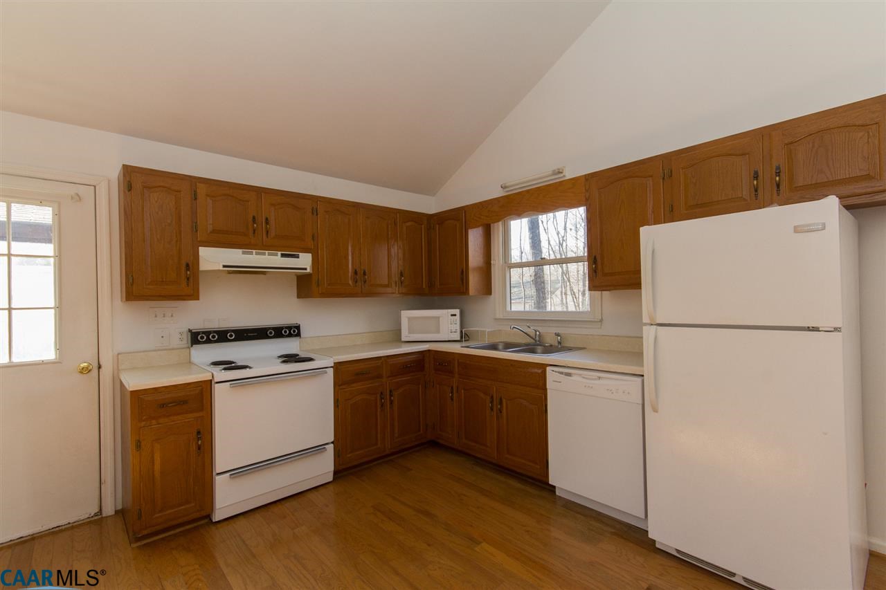 24 Hardwood Road Palmyra, VA 22963 - Photo 7 of 23 The Kitchen's Side Door Is Located Right Across From The Garage Side Door For Easy and Quick Access To Home.