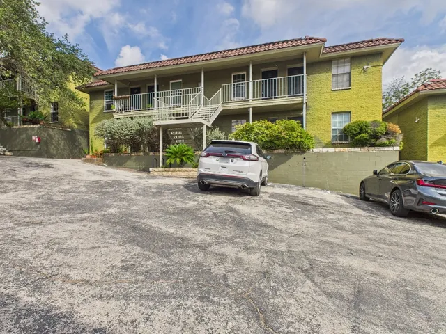 a car parked in front of a house