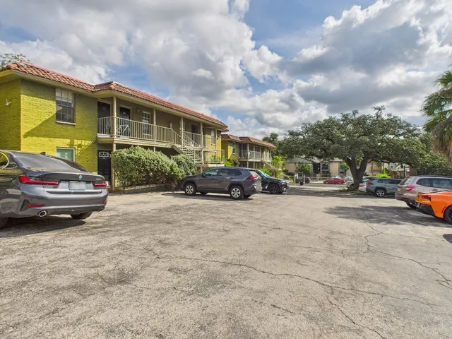 a car parked in front of a house