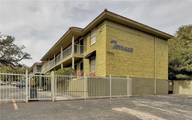 a front view of a house with a garage
