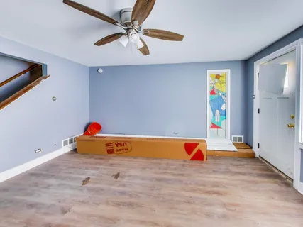 a workspace with a ceiling fan