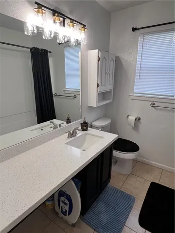 a bathroom with a shower and a shower