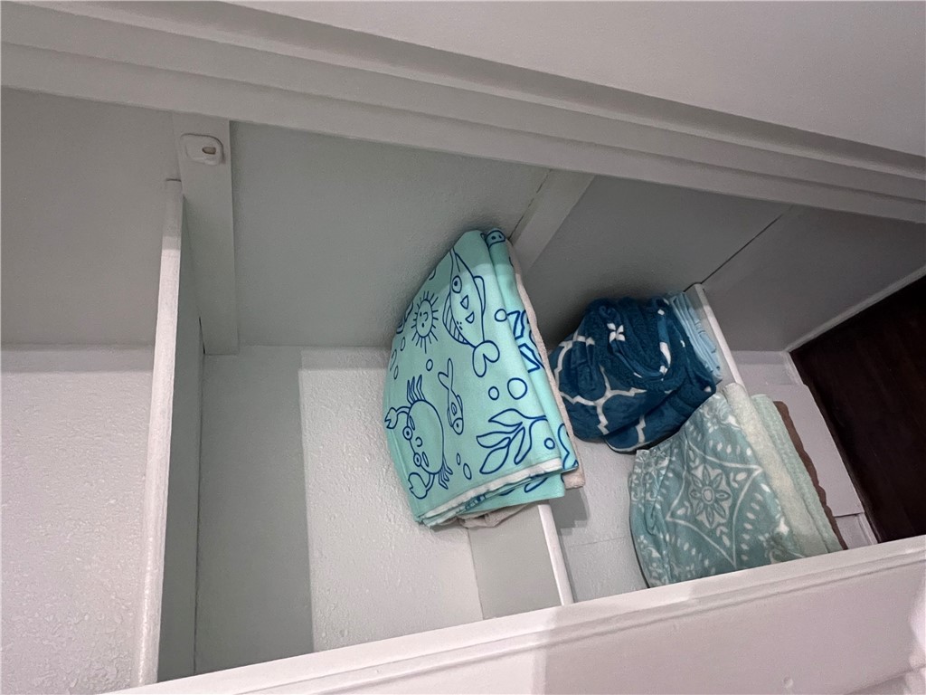 4507 Carter Creek Parkway, Unit 2 Bryan, TX 77802 - Photo 21 of 26 a wooden floor in a kitchen