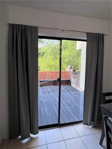 a view of a backyard of the house