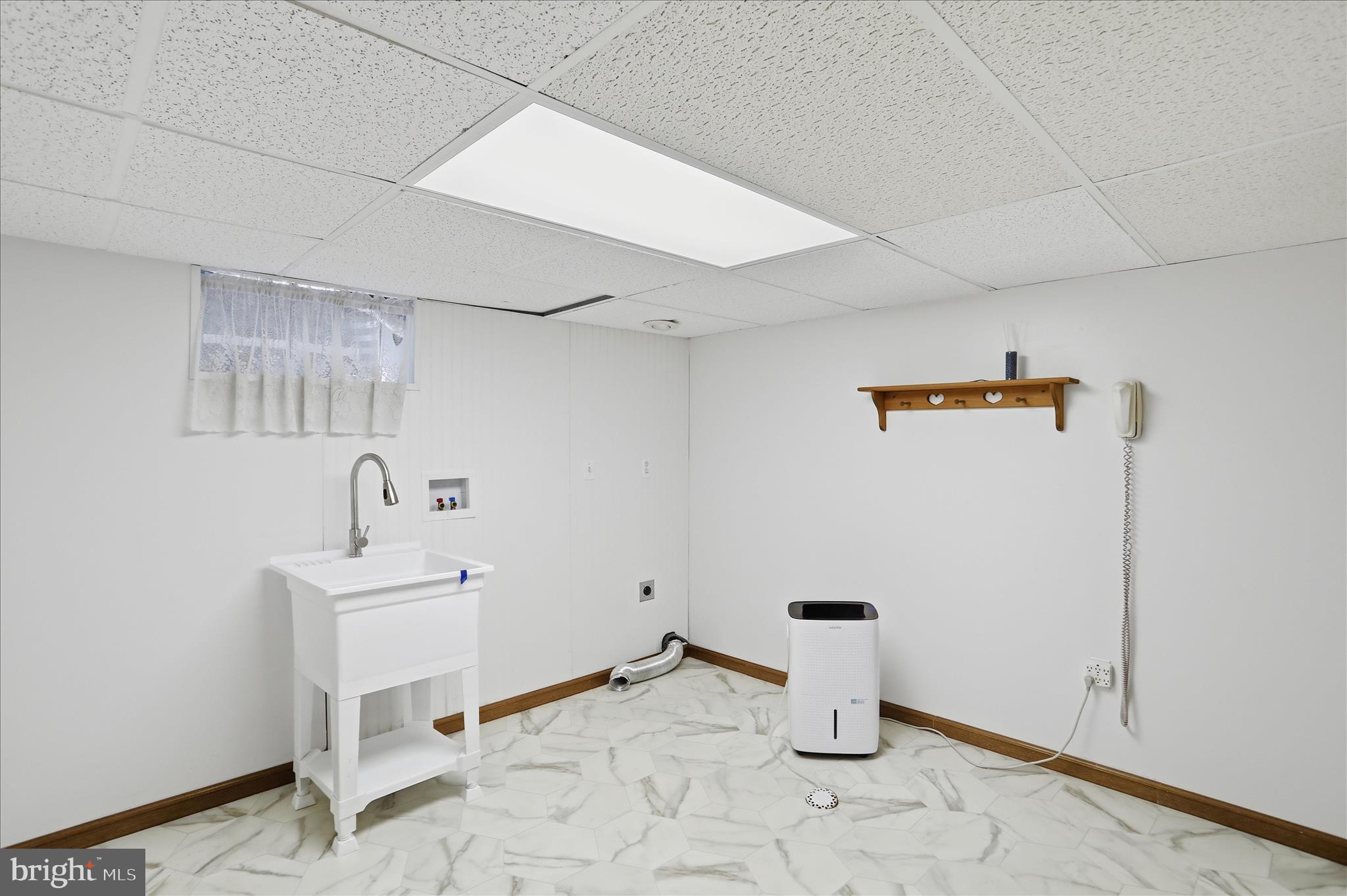 199 Buser Street Ridgeley, WV 26753 - Photo 24 of 49 a view of storage and utility room with a sink