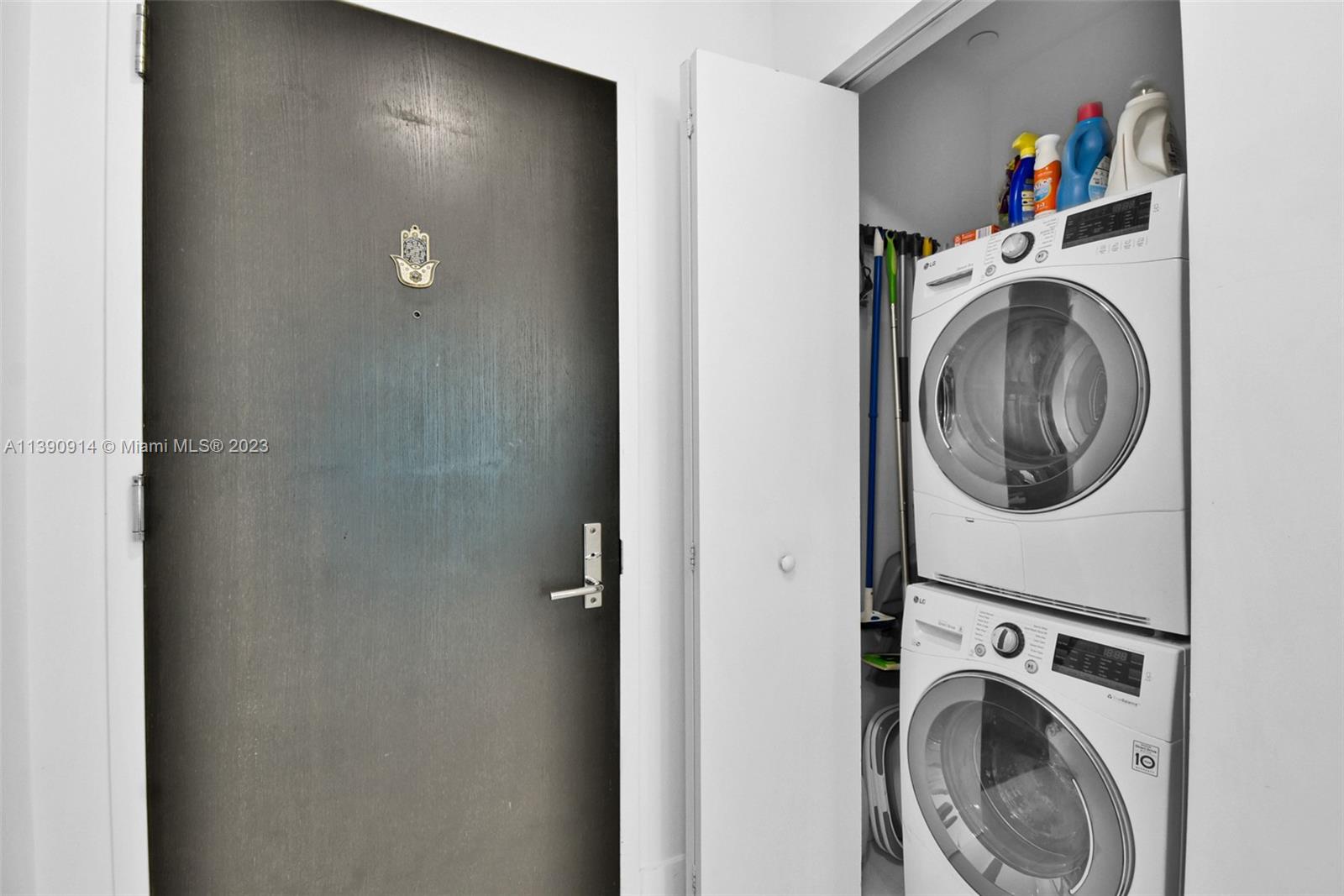 900 Biscayne Boulevard, Unit 4510 Miami, FL 33132 - Photo 38 of 48 a view of a storage & utility room with a washer dryer