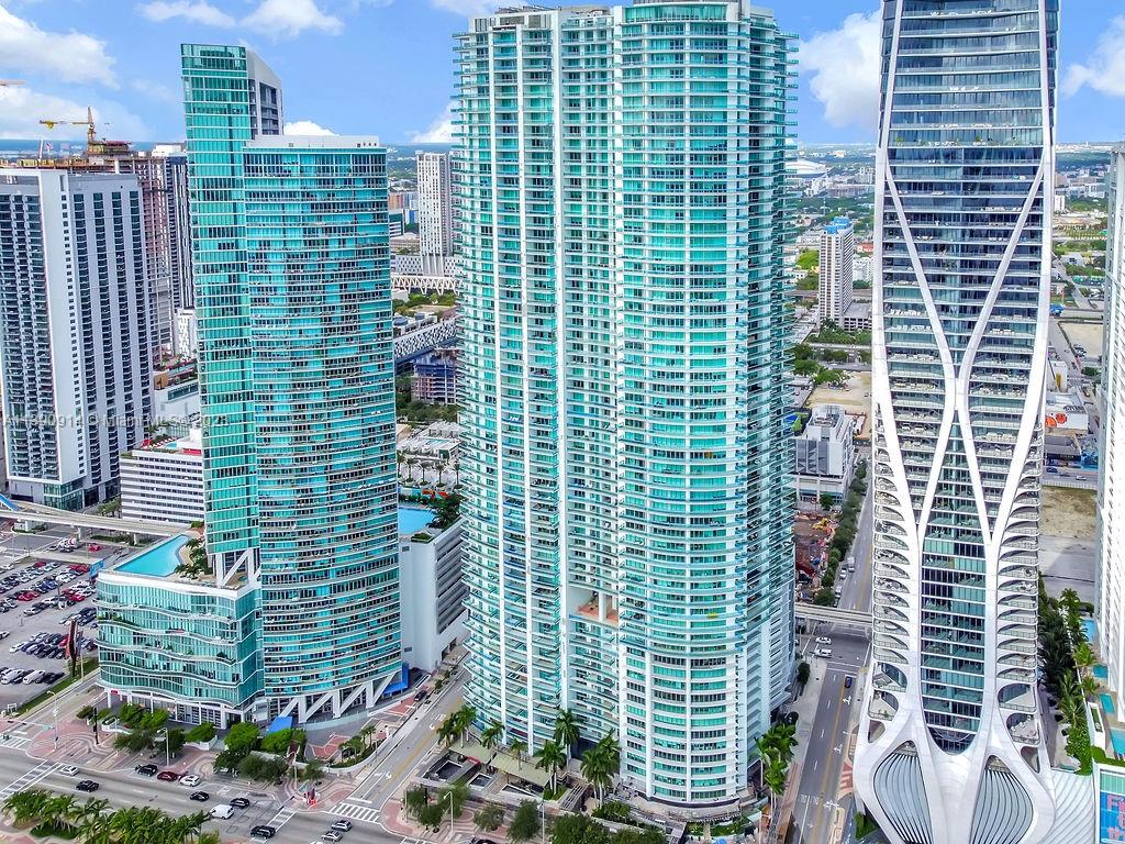900 Biscayne Boulevard, Unit 4510 Miami, FL 33132 - Photo 42 of 48 a view of a door and chair and potted plants
