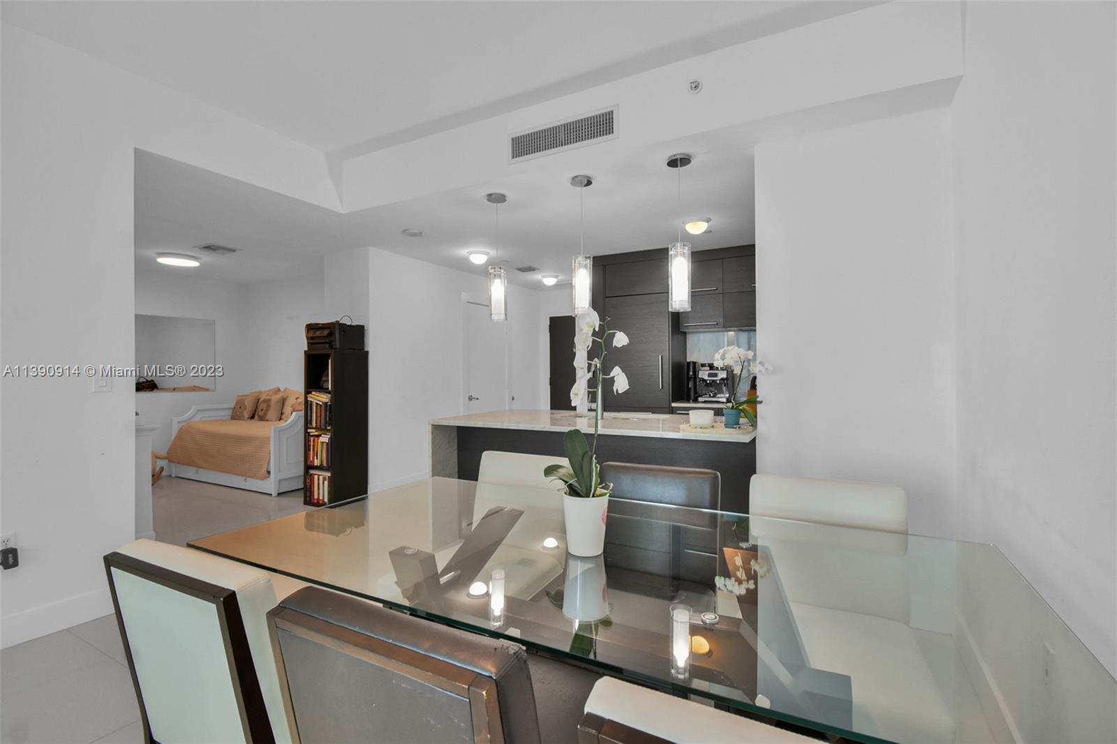 900 Biscayne Boulevard, Unit 4510 Miami, FL 33132 - Photo 8 of 48 a kitchen with stainless steel appliances a sink and a refrigerator