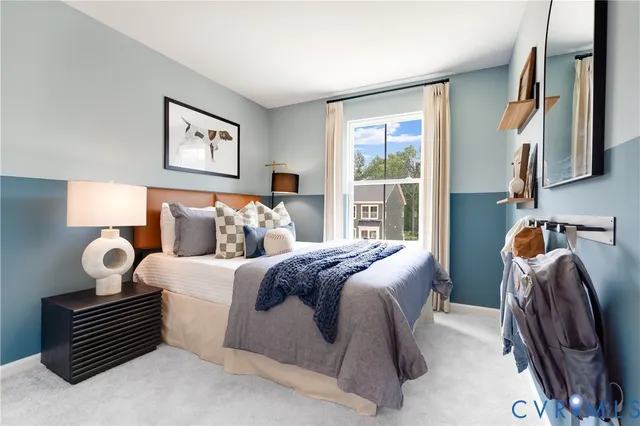 a bedroom with bed and a window