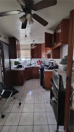 a kitchen with stainless steel appliances granite countertop a stove and a sink