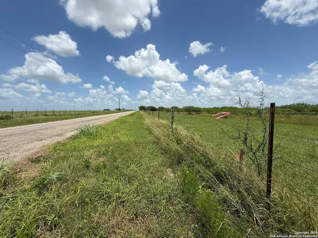 a view of an lake and a yard