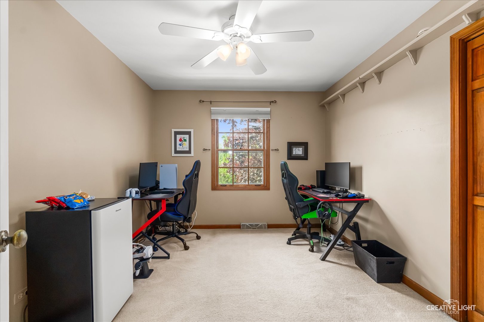 27W343 Churchill Road Winfield, IL 60190 - Photo 16 of 40 a view of a workspace with furniture and a window