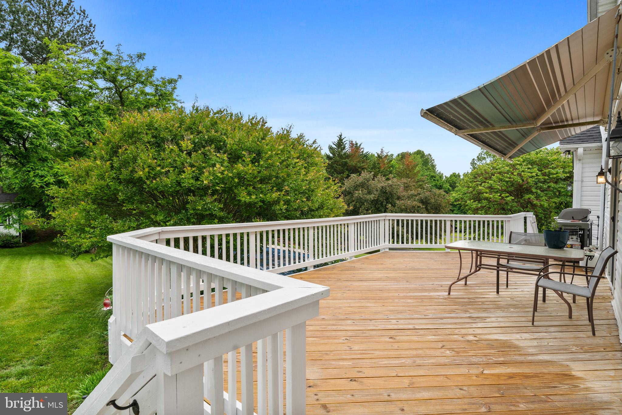 7950 Hampton Way Owings, MD 20736 - Photo 12 of 48 a view of a chairs and table on the patio