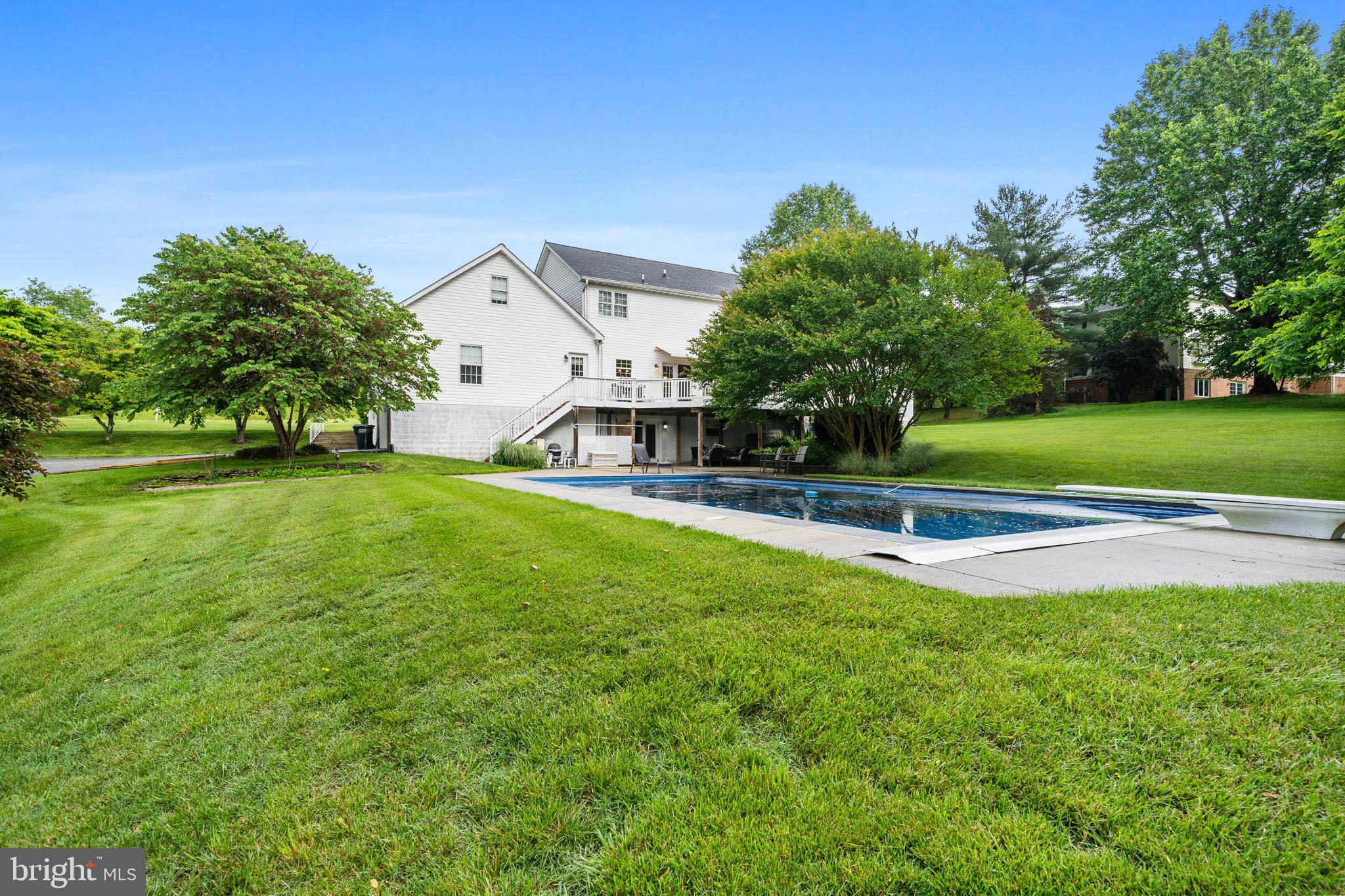 7950 Hampton Way Owings, MD 20736 - Photo 2 of 48 a view of a house with a big yard