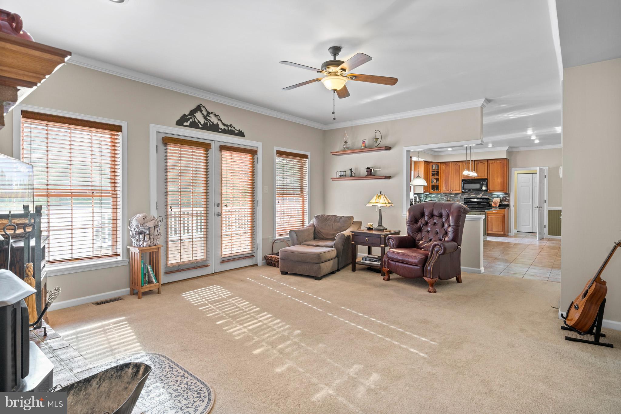 7950 Hampton Way Owings, MD 20736 - Photo 23 of 48 a bedroom with furniture and large windows