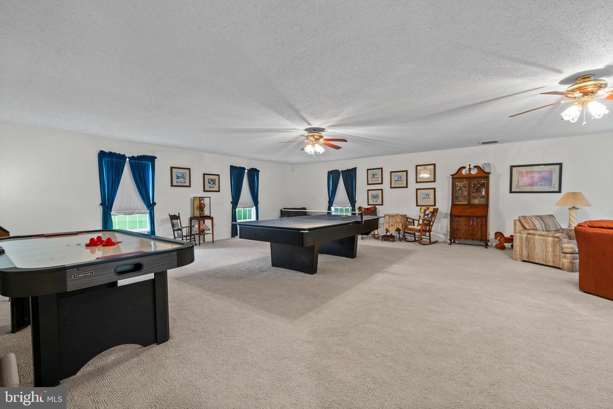 7950 Hampton Way Owings, MD 20736 - Photo 29 of 48 a living room with furniture and a table