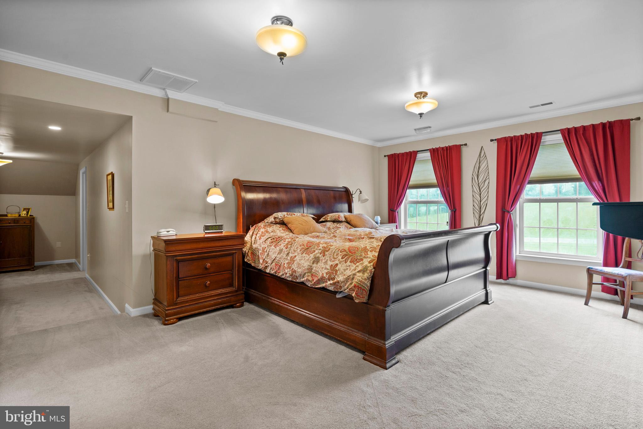 7950 Hampton Way Owings, MD 20736 - Photo 30 of 48 a bedroom with a bed and a large window