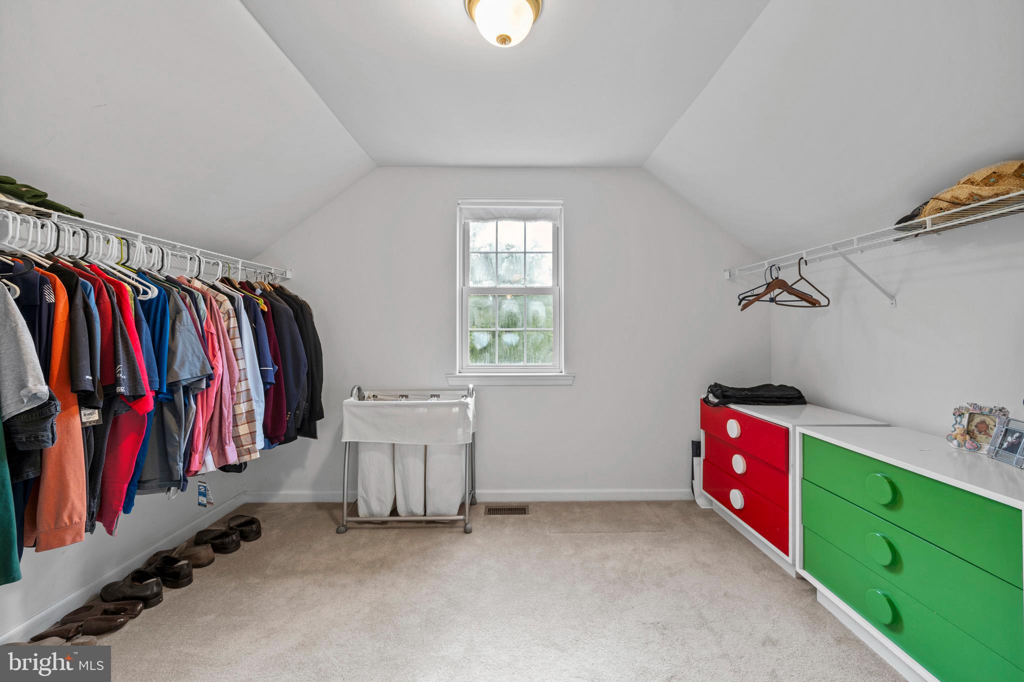 7950 Hampton Way Owings, MD 20736 - Photo 36 of 48 a view of walk in closet with clothes and shoes