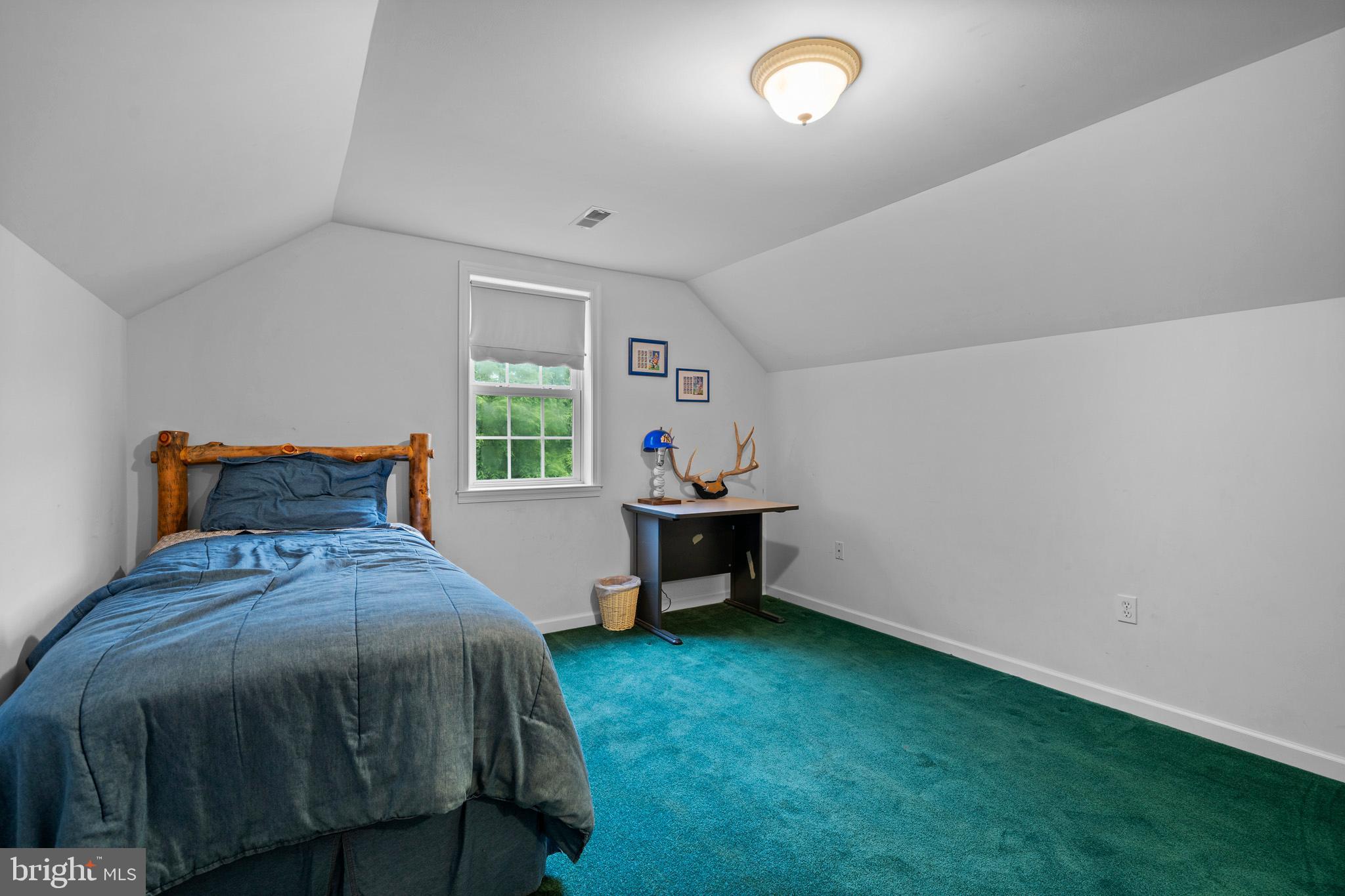 7950 Hampton Way Owings, MD 20736 - Photo 37 of 48 a bedroom with a bed and a window