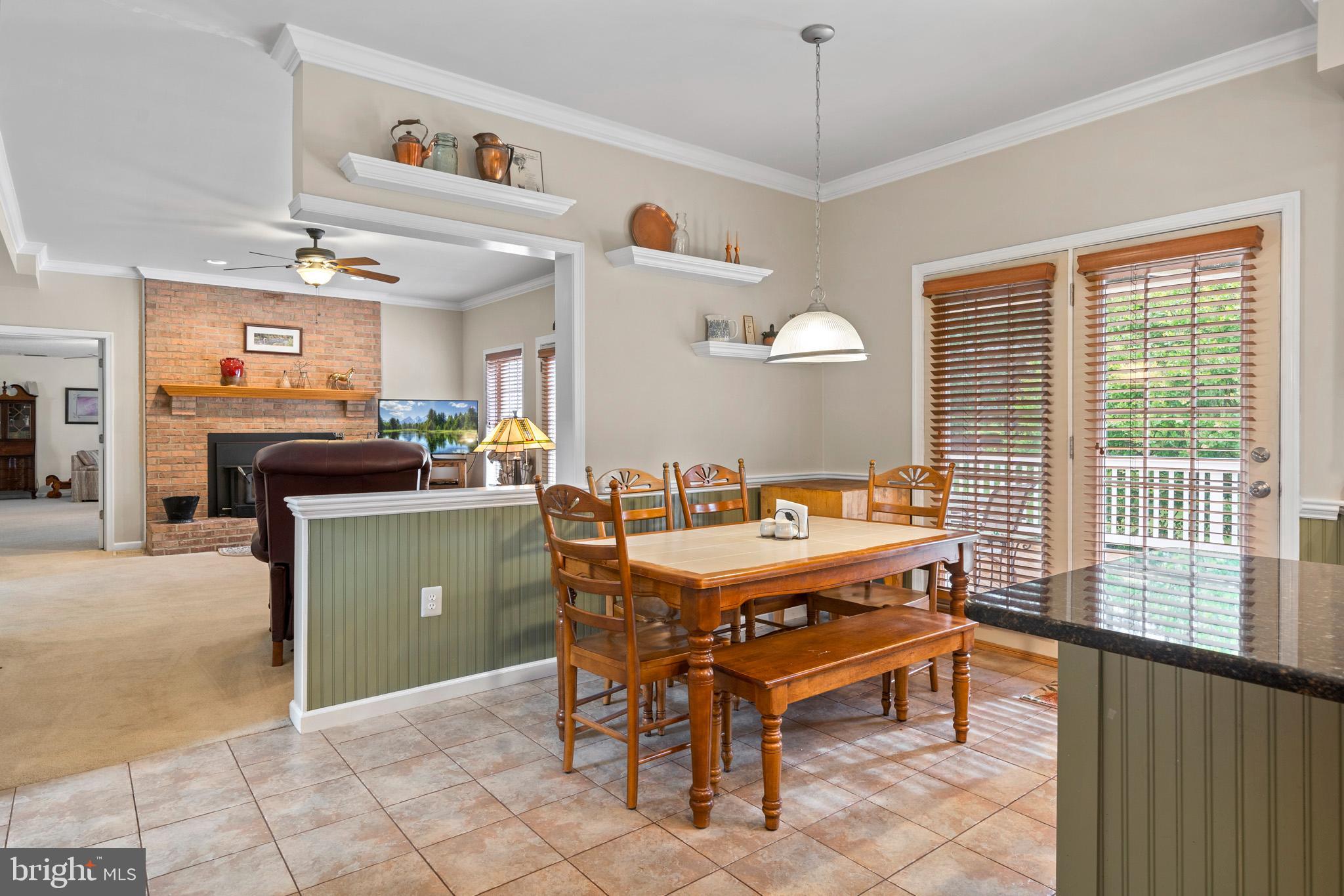 7950 Hampton Way Owings, MD 20736 - Photo 39 of 48 a dining room with furniture and window