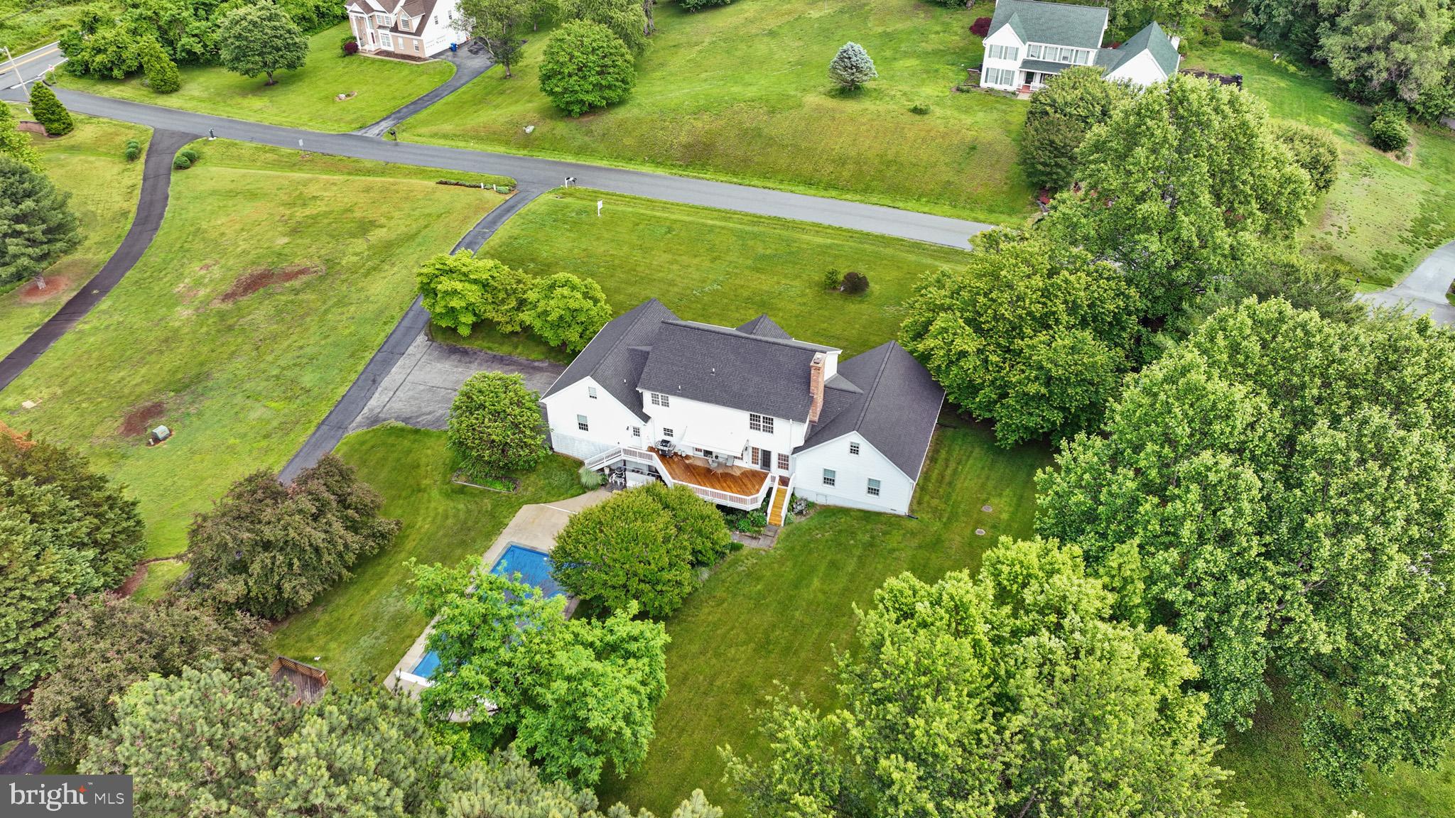 7950 Hampton Way Owings, MD 20736 - Photo 4 of 48 an aerial view of a house with a garden