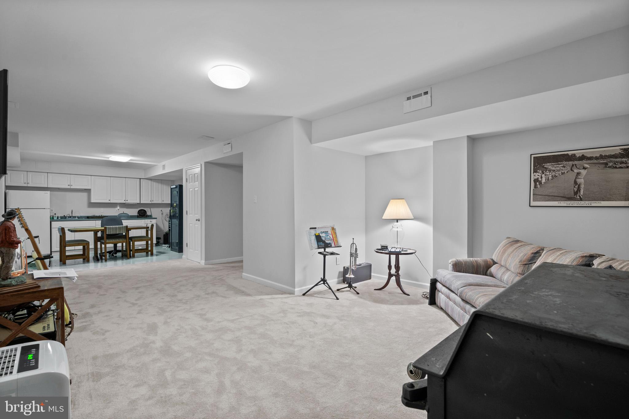 7950 Hampton Way Owings, MD 20736 - Photo 41 of 48 a living room with furniture a couch and a lamp