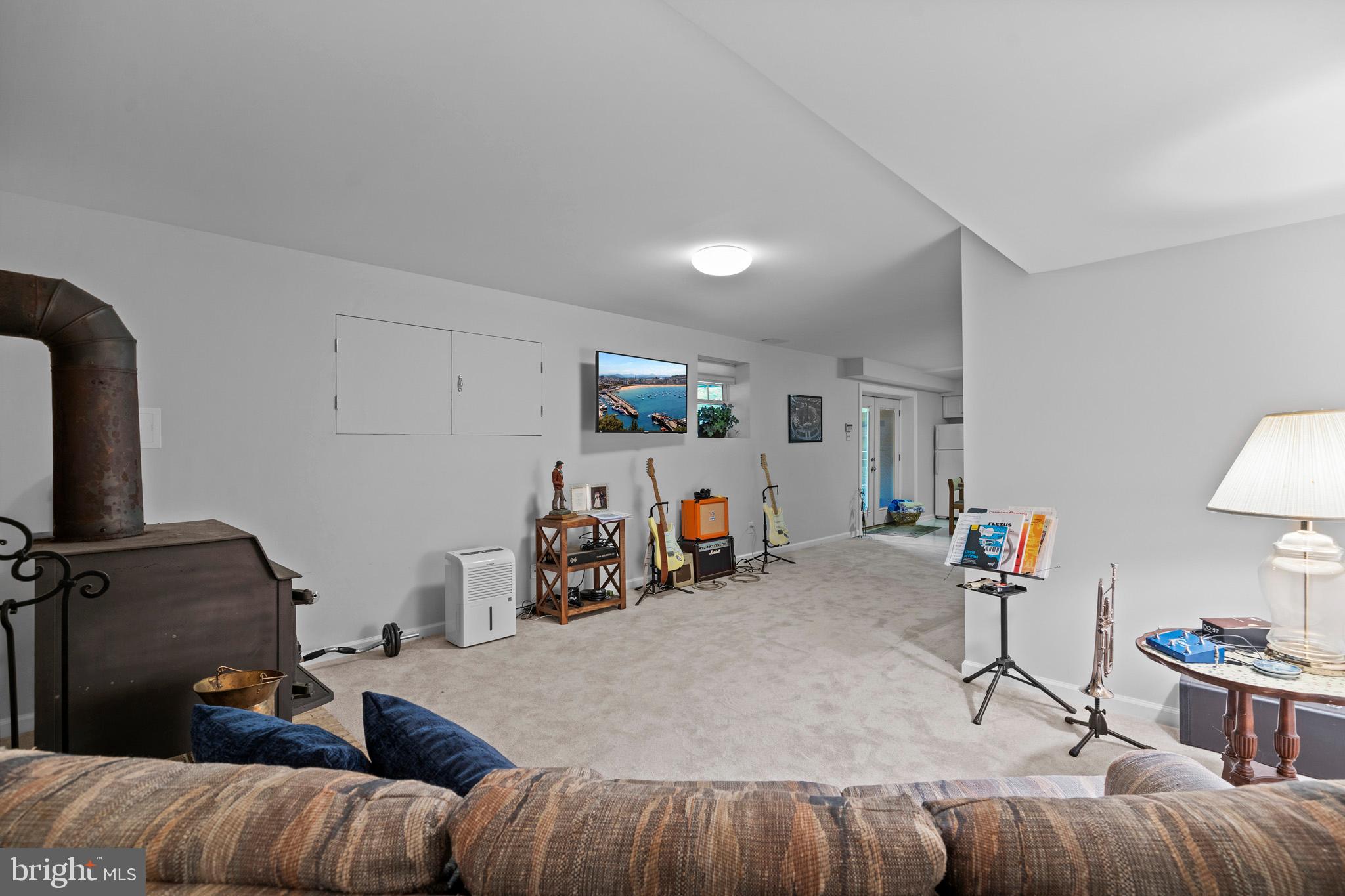 7950 Hampton Way Owings, MD 20736 - Photo 42 of 48 a living room with furniture and a flat screen tv