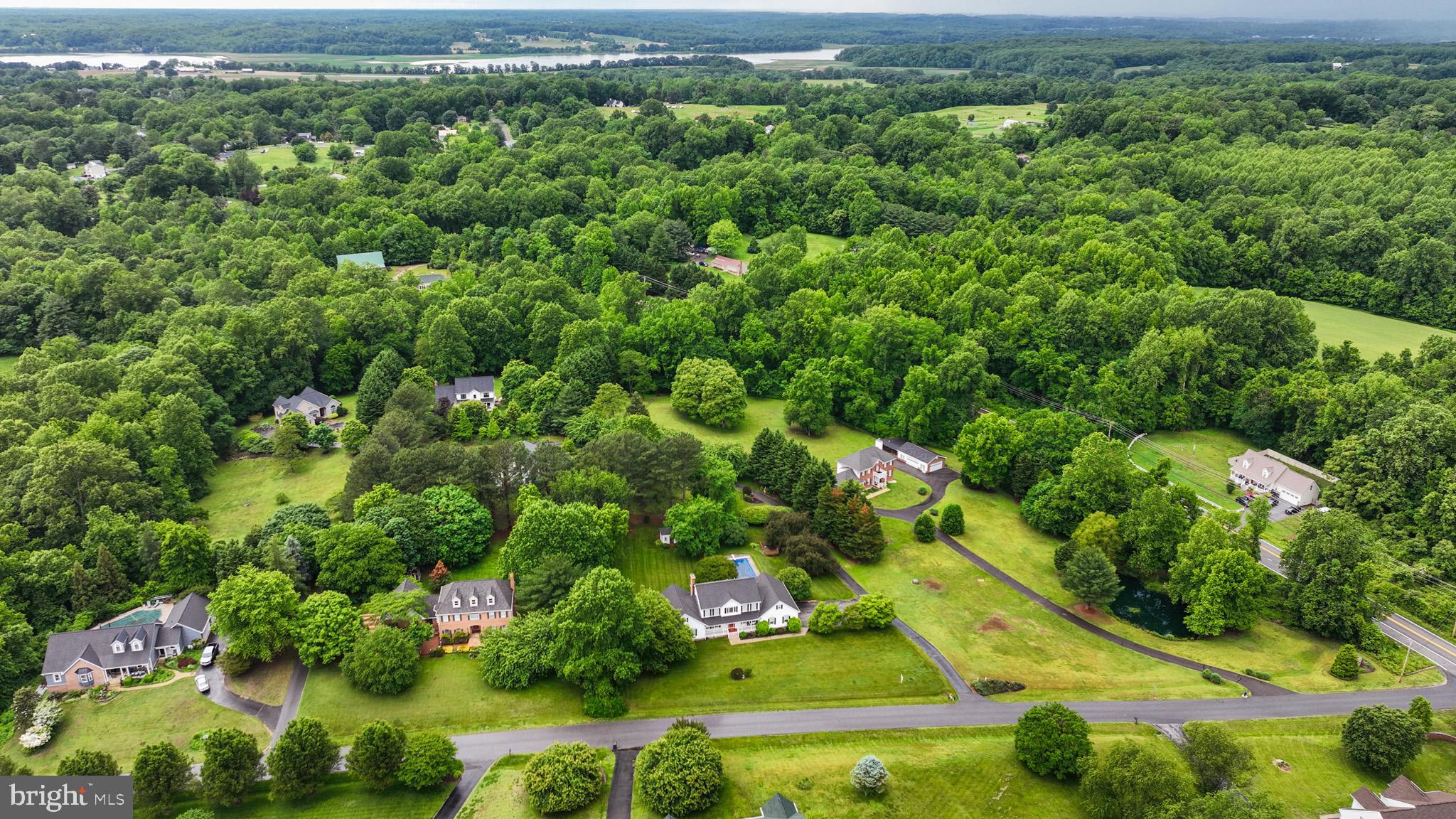 7950 Hampton Way Owings, MD 20736 - Photo 10 of 48 an aerial view of residential houses with outdoor space and trees