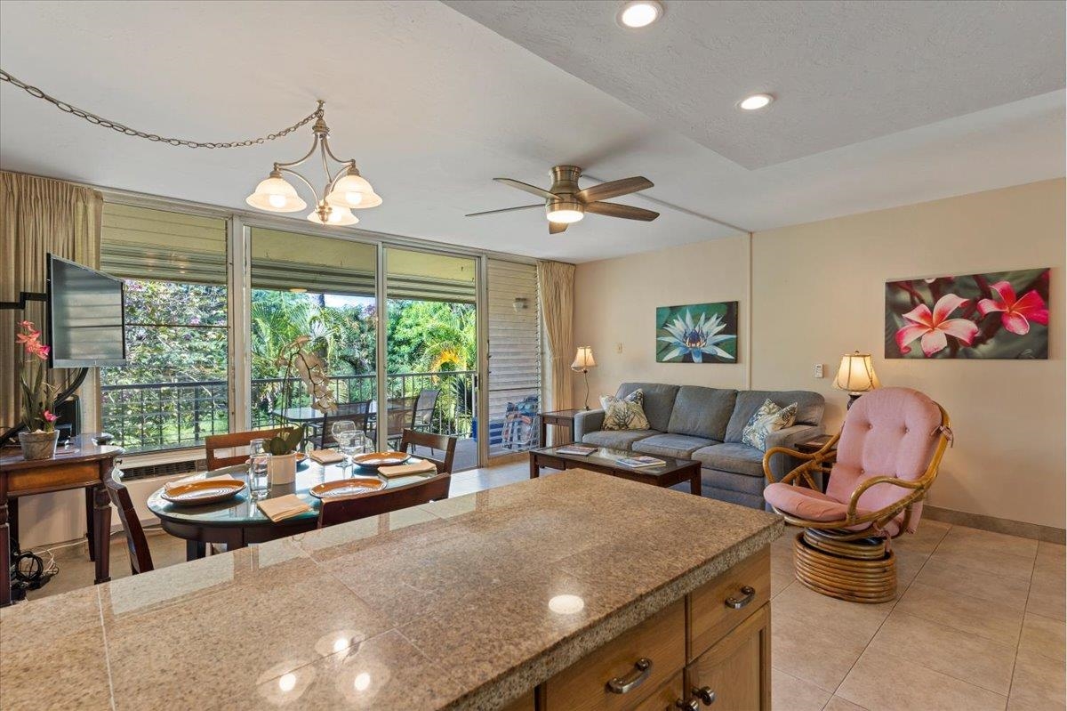 2495 South Kihei Road, Unit 254 Kihei, HI 96753 - Photo 15 of 30 a living room with furniture and a large window