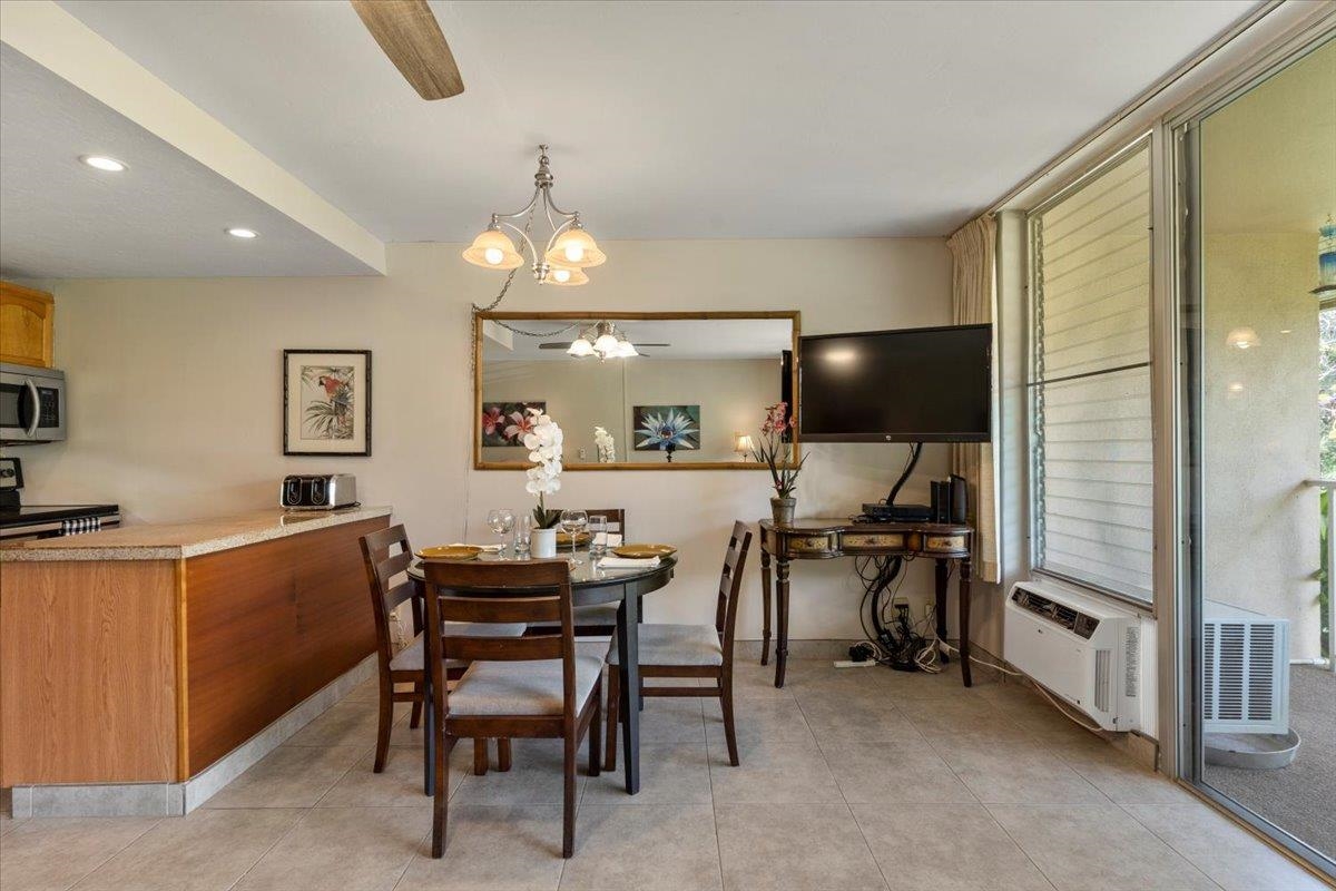 2495 South Kihei Road, Unit 254 Kihei, HI 96753 - Photo 16 of 30 a view of a dining room with furniture