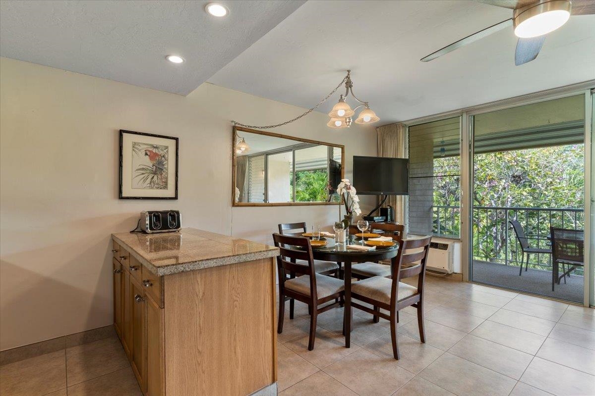 2495 South Kihei Road, Unit 254 Kihei, HI 96753 - Photo 17 of 30 a view of a dining room with furniture window and outside view