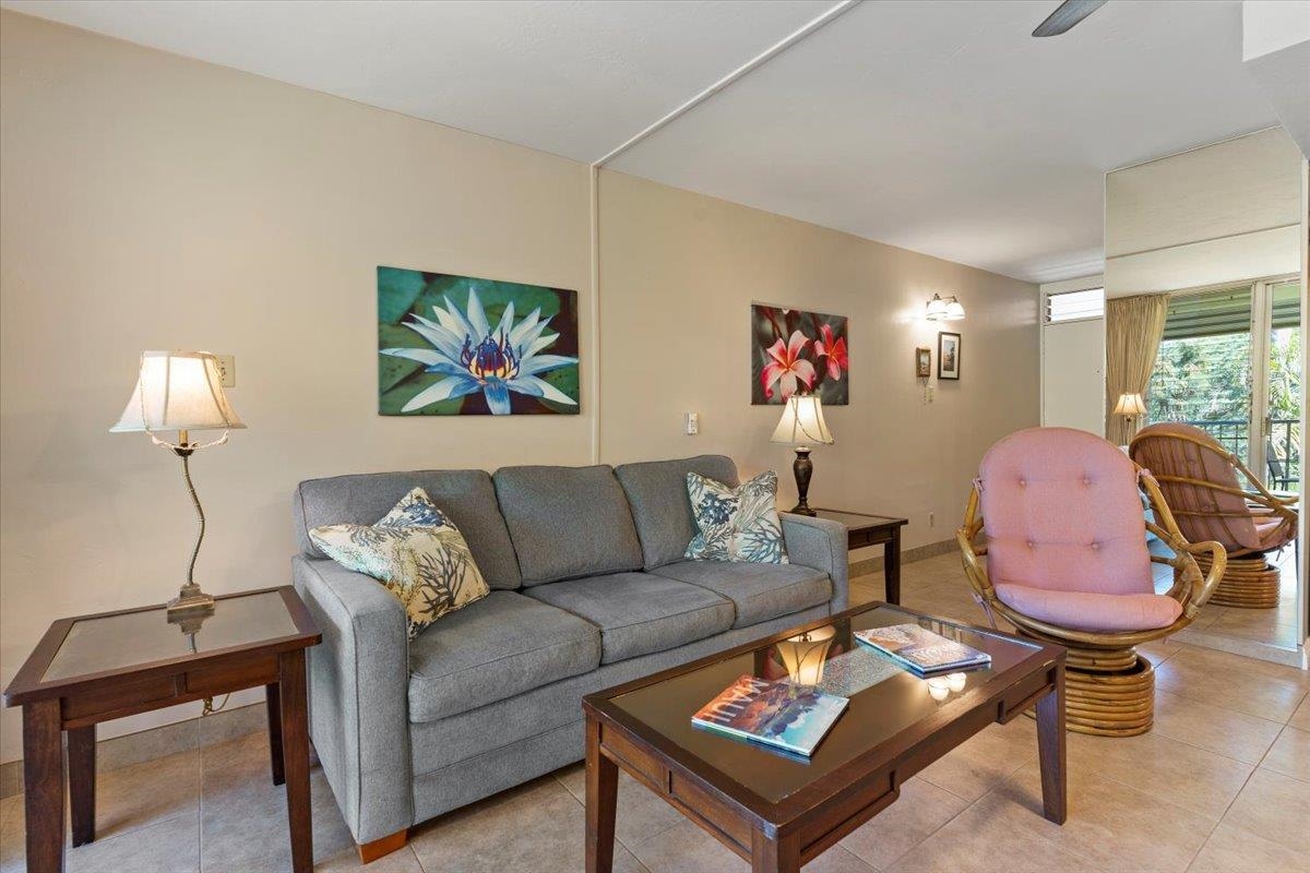 2495 South Kihei Road, Unit 254 Kihei, HI 96753 - Photo 18 of 30 a living room with furniture a rug and a lamp